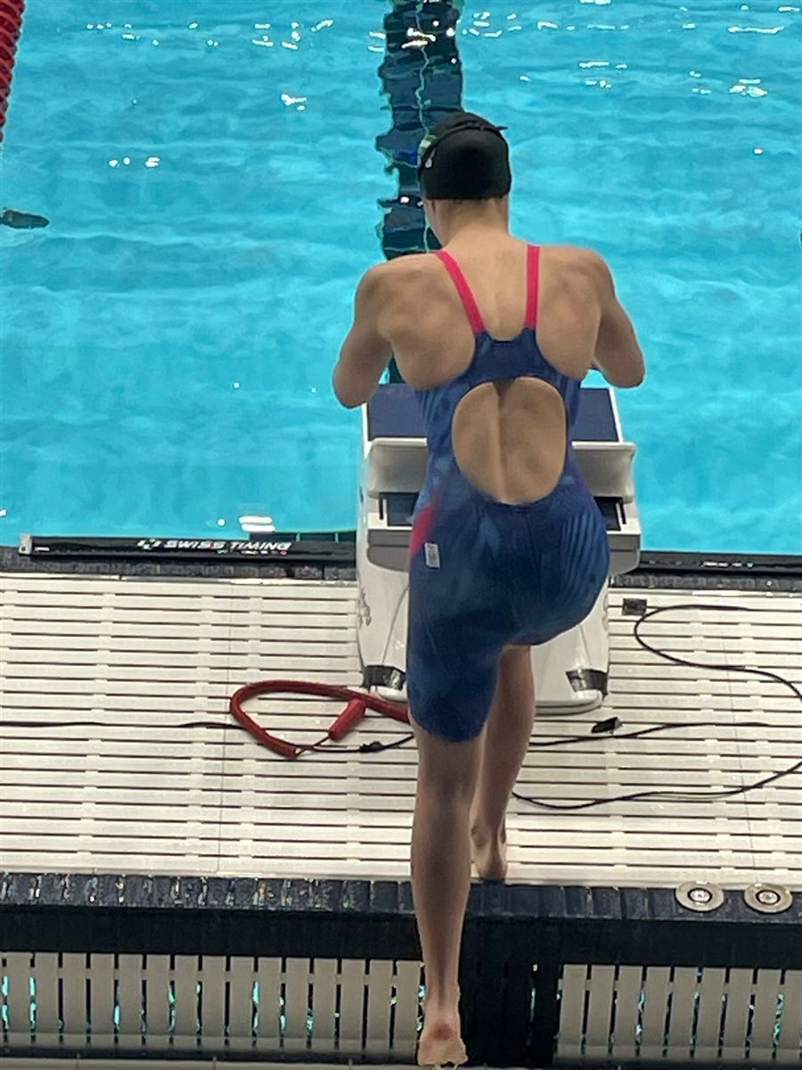 From behind on the starting block before a race
